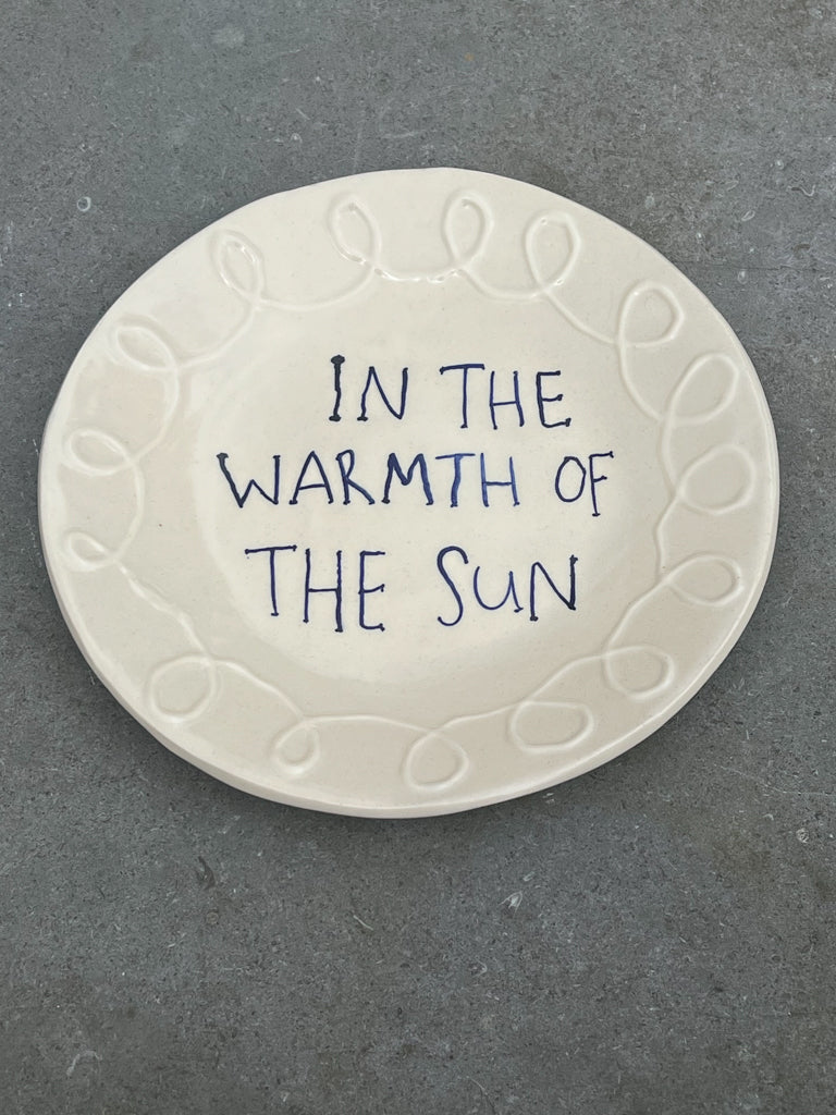 The Warmth of the Sun Plates Set