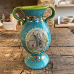 Turquiose Urn with Snowdrop and House